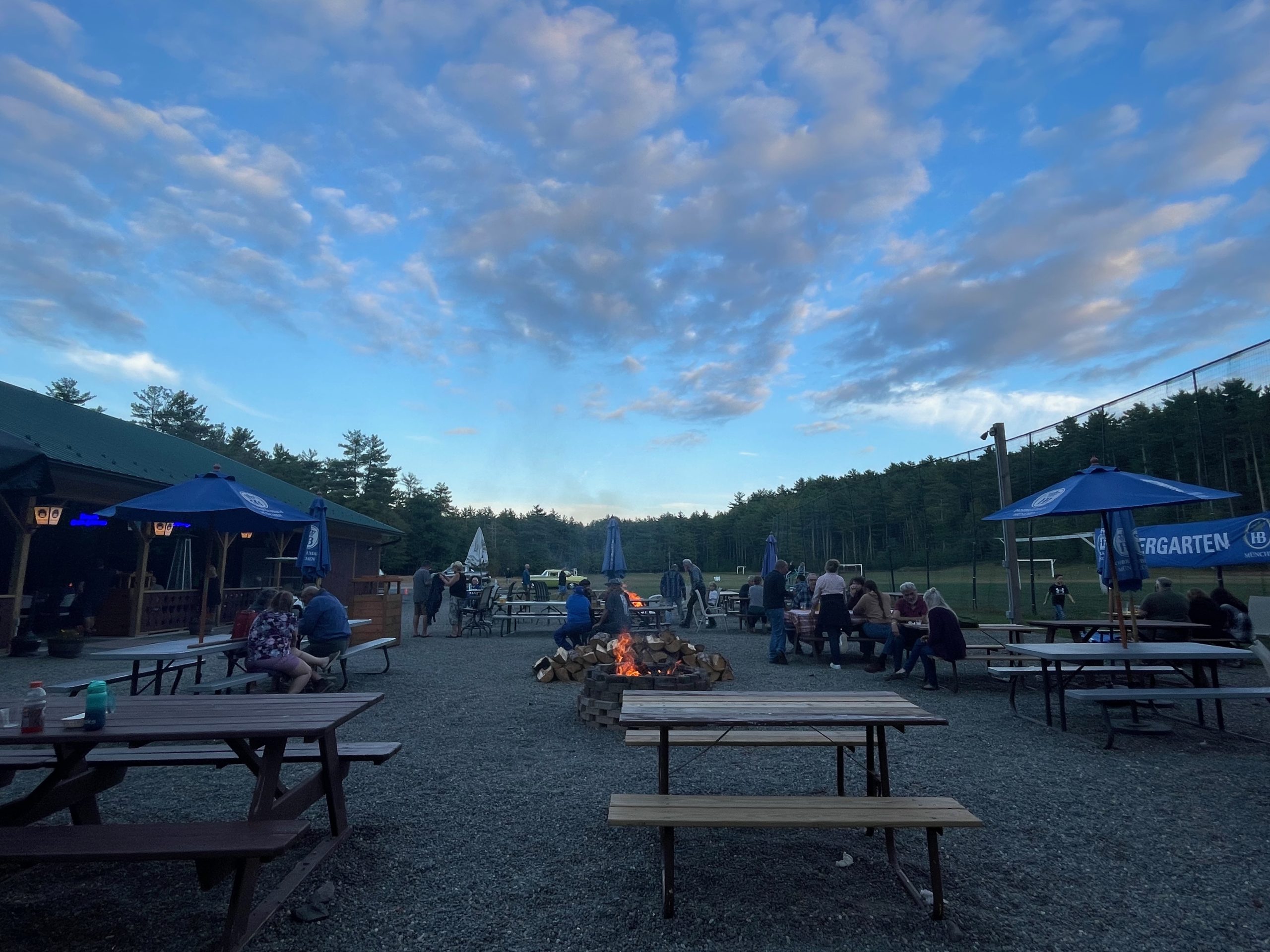 Folks enjoying food and beautiful weather at Nussy's