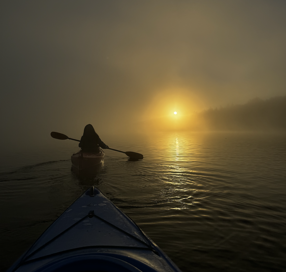 Miss New York paddling on Raquette Lake