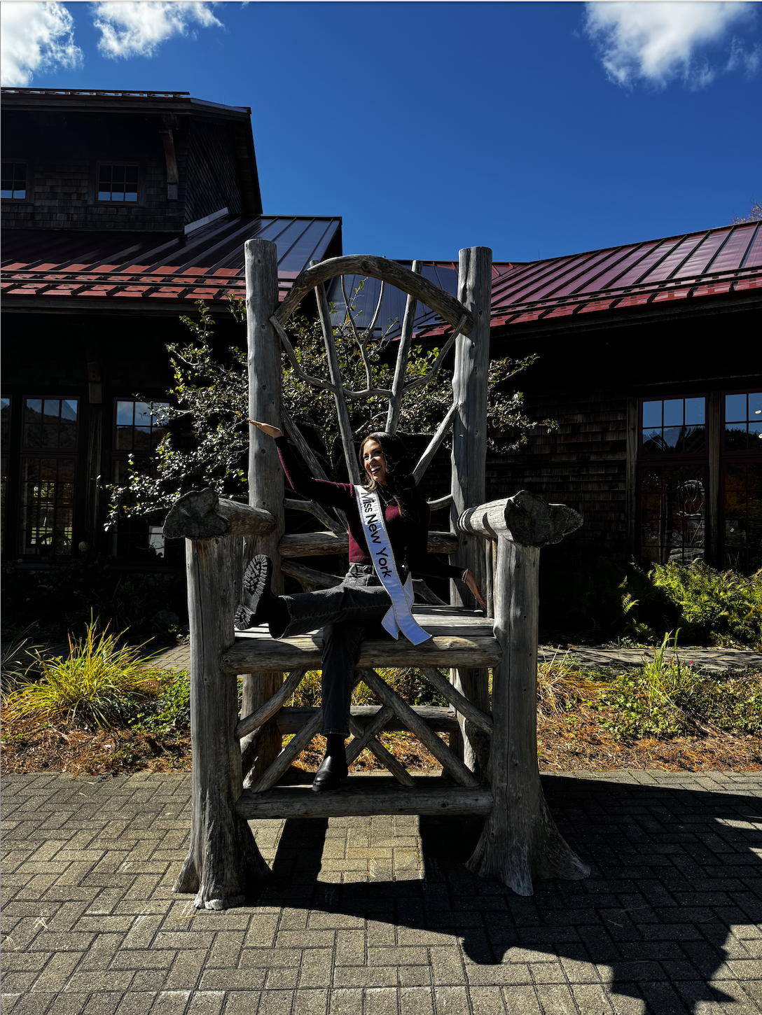 JMiss NY Poses on Adirondack Big Chair